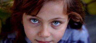 redhead girl with blue eyes